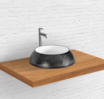 designer black table top wash basin.